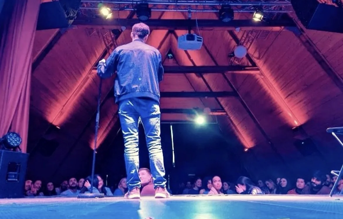 Eirik performing on a large stage
